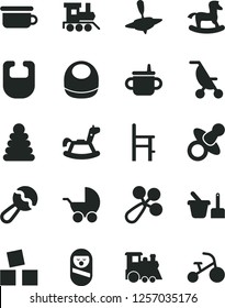Solid Black Vector Icon Set - dummy vector, mug for feeding, bib, baby, beanbag, rattle, stroller, summer, stacking rings, roly poly doll, toy sand set, children's potty, a chair, train, small yule