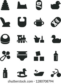 Solid Black Vector Icon Set - mug for feeding vector, bottle, measuring, diaper, bib, baby, rattle, car child seat, rubber duck, duckling, children's bathroom, stacking rings, roly poly doll, train