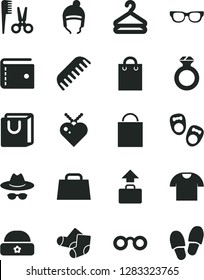 Solid Black Vector Icon Set - paper bag vector, purse, hat with glasses, accessories for a hairstyle, comb, Knitted Socks, shoes little children, winter, warm, handles, T shirt, hanger, hand