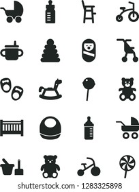 Solid Black Vector Icon Set - baby cot vector, mug for feeding, bottle, measuring, bib, stroller, carriage, sitting, stacking rings, roly poly doll, toy sand set, a chair child, teddy bear, small