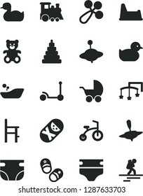Solid Black Vector Icon Set - toys over the cot vector, diaper, nappy, baby rattle, stroller, rubber duck, duckling, children's bathroom, stacking toy, tumbler, potty chair, a for feeding, train