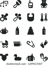 Solid Black Vector Icon Set - toys over the cot vector, dummy, mug for feeding, measuring cup, bottle, bib, Child T shirt, beanbag, baby rattle, carriage, open pin, rubber duck, stacking rings