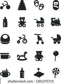 Solid Black Vector Icon Set - mug for feeding vector, bottle, measuring, baby bib, stroller, carriage, sitting, stacking rings, roly poly doll, children's potty, teddy bear, small, train, yule