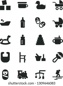 Solid Black Vector Icon Set - toys over the cradle vector, mug for feeding, bottle, measuring, bib, beanbag, baby stroller, carriage, rubber duck, children's bathroom, stacking rings, roly poly doll