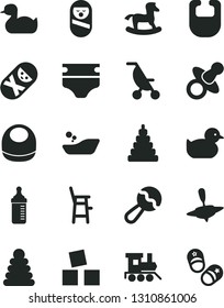 Solid Black Vector Icon Set - dummy vector, measuring bottle for feeding, diaper, bib, baby, beanbag, summer stroller, rubber duck, duckling, children's bathroom, stacking rings, toy, roly poly doll