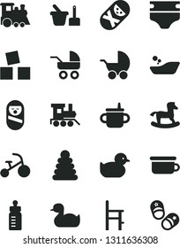 Solid Black Vector Icon Set - mug for feeding vector, bottle, diaper, baby stroller, carriage, rubber duck, duckling, children's bathroom, stacking rings, roly poly doll, tumbler, toy sand set
