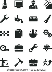 Solid Black Vector Icon Set - monitor window vector, clean paper, builder, gears, arm saw, long meashuring tape, plastic brush, ceramic tiles, helmet, brick, hammer with claw, suitcase, coal mining