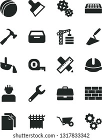 Solid Black Vector Icon Set - clean paper vector, bath ball, tower crane, brickwork, building trolley, trowel, measuring tape, writing accessories, construction helmet, brick, putty knife, drawer
