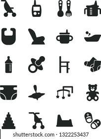 Solid Black Vector Icon Set - toys over the cot vector, dummy, mug for feeding, measuring cup, bottle, nappy, bib, car child seat, summer stroller, sitting, children's bathroom, stacking toy