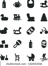 Solid Black Vector Icon Set - mug for feeding vector, bottle, measuring, bib, beanbag, Baby chair, stroller, rubber duck, duckling, stacking rings, roly poly doll, tumbler, toy sand set, a child