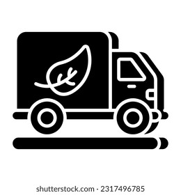 Un icono de diseño sólido de un camión ecológico