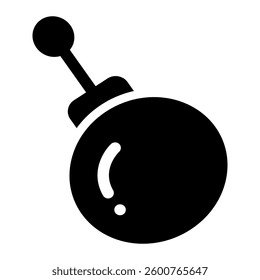 Solid icon of a Christmas tree ornament ball with a hanging loop. Bold and minimal design representing festive holiday decorations.