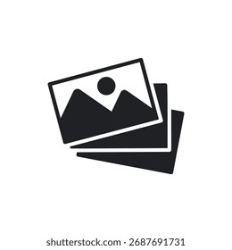 Solid icon showing a pile or stack of multiple photographs or images.