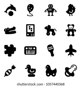 Solid vector icon set - dolphin vector, balloon smile, robot, chicken toy, crocodile, game console, wheel horse, bear, puzzle, piano, beanbag, plane, dart, duck, soother