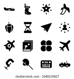 Solid vector icon set - small plane vector, christmas sock, star, banana, sweet pepper, sand clock, paper, man, sea turtle, photo, atom core, clamp, horse stick toy, piano, car
