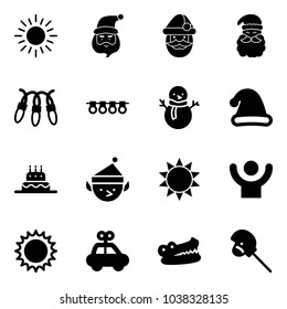 Solid vector icon set - sun vector, santa claus, garland, snowman, christmas hat, cake, elf, success, car toy, crocodile, horse stick