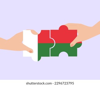Solidarity and togetherness in Madagascar, 2 puzzle pieces, Madagascar people helping each other, unity and help idea, vector design, support and charity concept, union of society