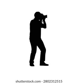 A solitary figure's profile in shadow focused on composition. Ideal for media production creative industries or illustrating artistic pursuits.