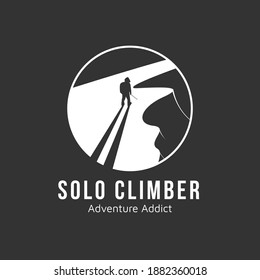 Solo climber on mountain peak for adventure club logo design