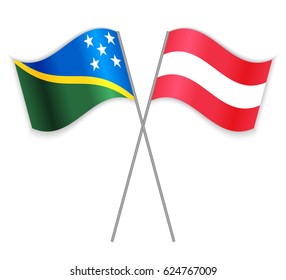 Solomon Island and Austrian crossed flags. Solomon Islands combined with Austria isolated on white. Language learning, international business or travel concept.