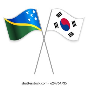 Solomon Island and South Korean crossed flags. Solomon Islands combined with South Korea isolated on white. Language learning, international business or travel concept.