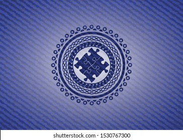solution icon inside badge with denim texture