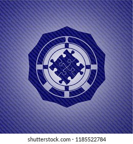 solution icon inside emblem with denim texture