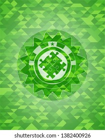 solution icon inside green mosaic emblem