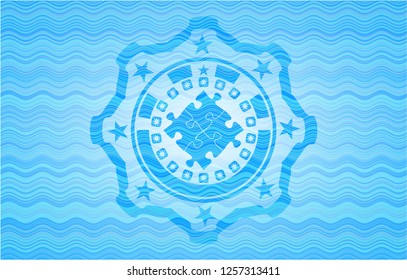 solution icon inside sky blue water emblem.