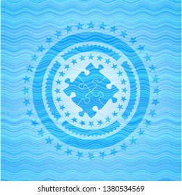 solution icon inside sky blue water wave badge.