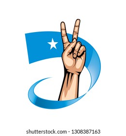 Somalia flag and hand on white background. Vector illustration