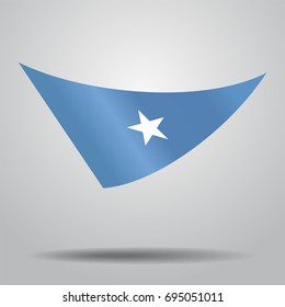 Somalian flag wavy abstract background. Vector illustration.