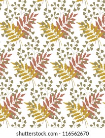 some autumn colored leaves on white background-seamless