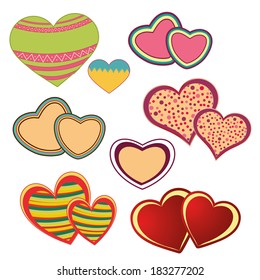 some colored hearts with some textures in white background