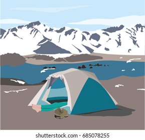 Someone lying in the camp tent in front of a snowy mountain view.