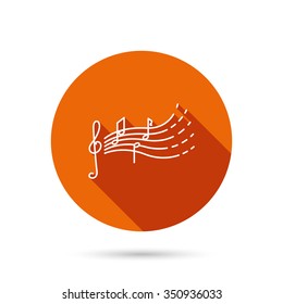 Songs for kids icon. Musical notes, melody sign. G-clef symbol. Round orange web button with shadow.