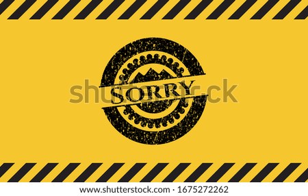 Sorry black grunge emblem inside yellow warning sign. Vector Illustration. Detailed.