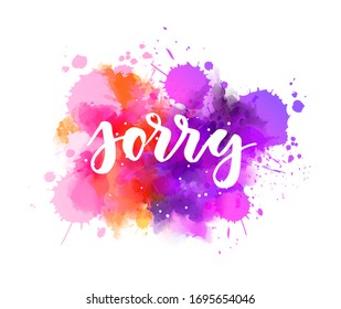 Sorry - handwritten modern calligraphy lettering on abstract watercolor paint splash background. Purple and pink colored. Apology concept illustration.