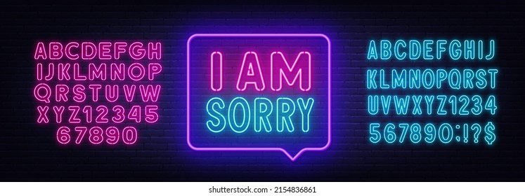 I am sorry neon sign in the speech bubble on brick wall background.