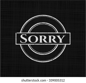 Sorry written on a blackboard
