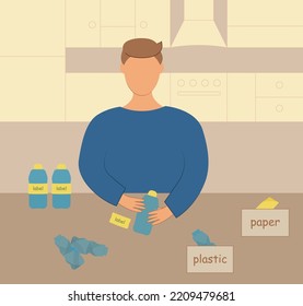 sorting household waste. a man in the kitchen sorting household waste