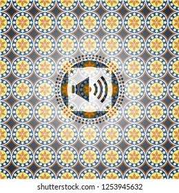 sound icon inside arabesque style emblem. arabic decoration.