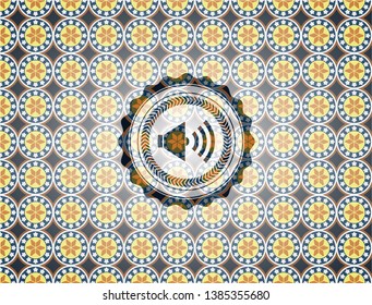 sound icon inside arabesque style emblem. arabic decoration.