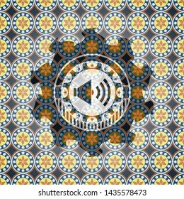 sound icon inside arabesque style emblem. arabic decoration.