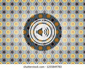 sound icon inside arabic badge background. Arabesque decoration.