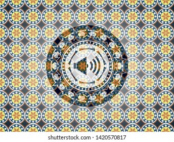 sound icon inside arabic badge background. Arabesque decoration.