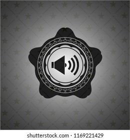 sound icon inside black badge