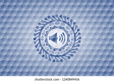 sound icon inside blue polygonal badge.