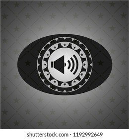 sound icon inside dark emblem. Retro