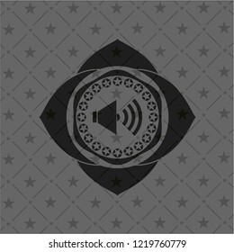 sound icon inside dark emblem
